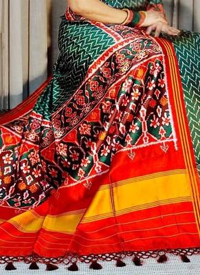 Green Color Lagadi Patta and weaved zari border Work Silk Patola Saree 1