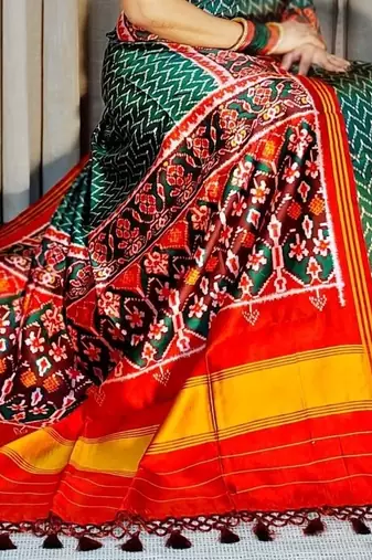 Green Color Lagadi Patta and weaved zari border Work Silk Patola Saree