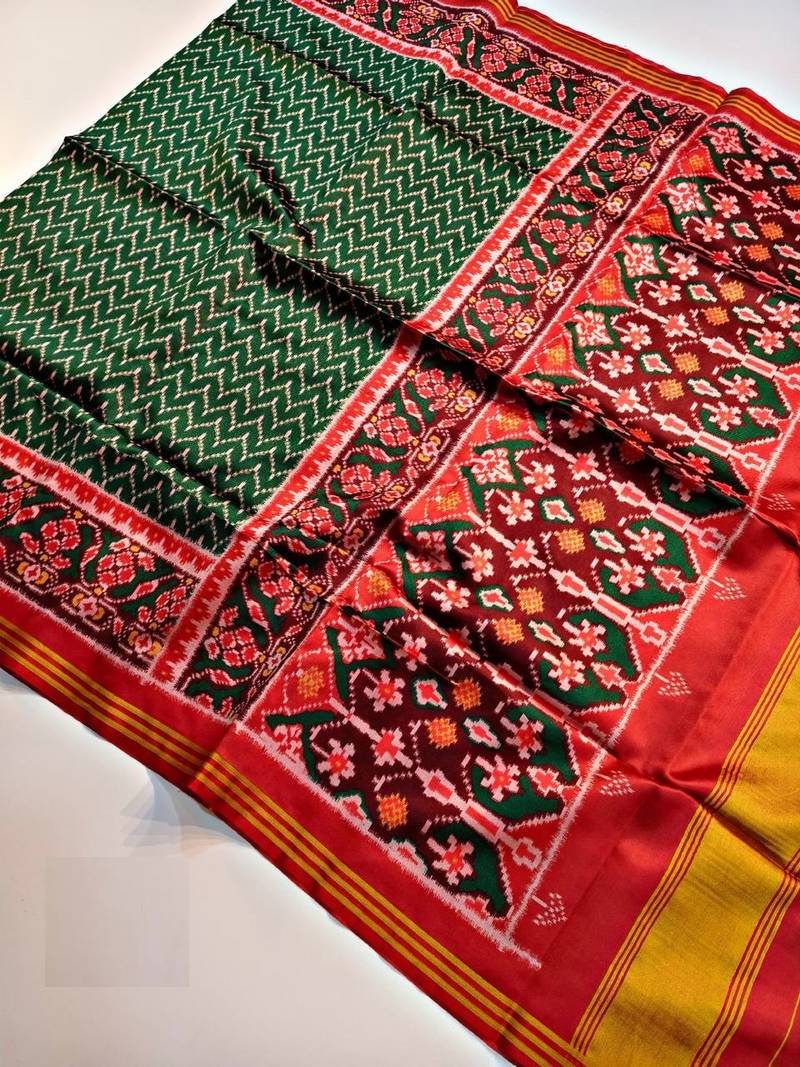 Green Color Lagadi Patta and weaved zari border Work Silk Patola Saree