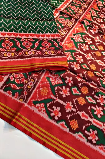 Green Color Lagadi Patta and weaved zari border Work Silk Patola Saree