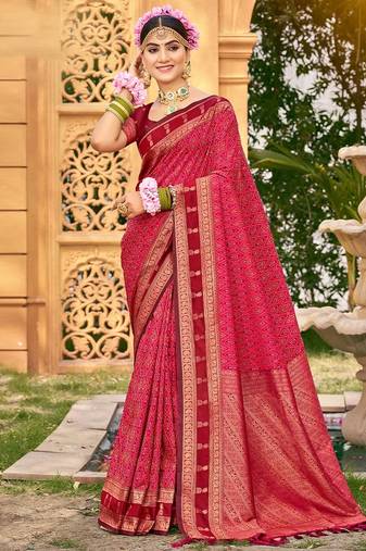 Rich and ethnic looking pink color woven soft silk saree