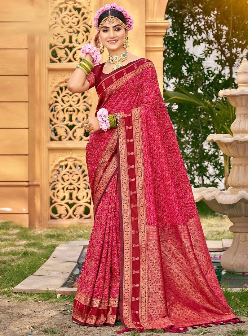 Rich and ethnic looking pink color woven soft silk saree