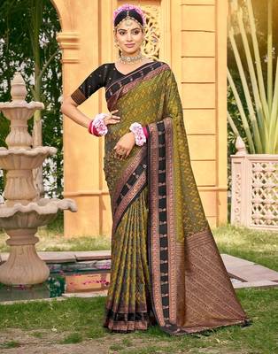 Rich and ethnic looking mahendi woven soft silk blend saree 1