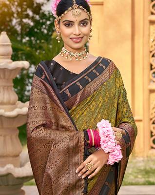 Rich and ethnic looking mahendi woven soft silk blend saree 2