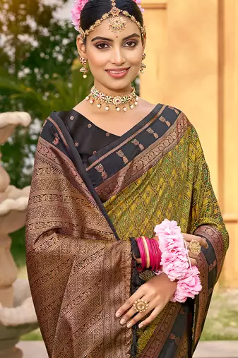 Rich and ethnic looking mahendi woven soft silk blend saree