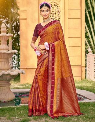Rich and ethnic looking rust woven soft silk blend saree 1