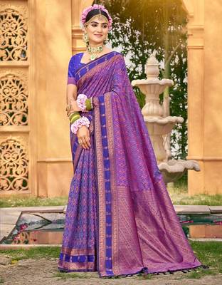Rich and ethnic looking purple woven soft silk blend saree 1