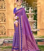 Rich and ethnic looking purple color woven soft silk saree