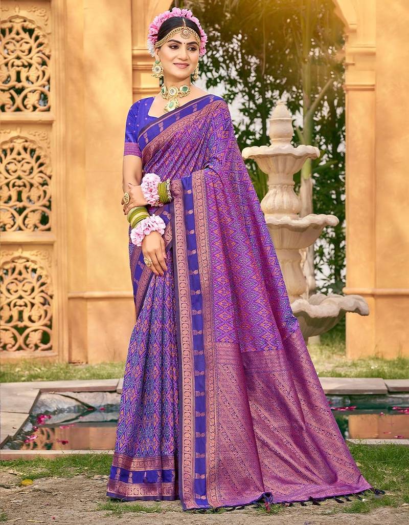 Rich and ethnic looking purple color woven soft silk saree