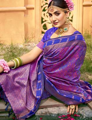Rich and ethnic looking purple woven soft silk blend saree 2