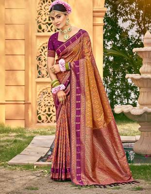Rich and ethnic looking yellow woven soft silk blend saree 1