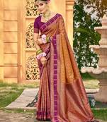 Rich and ethnic looking yellow color woven soft silk saree