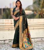 Dark green color paithani silk fabric beautiful traditional rich saree
