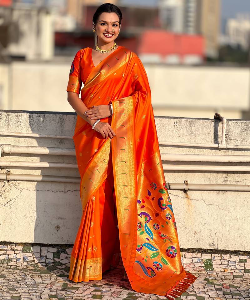 Orange color paithani silk fabric beautiful traditional rich saree