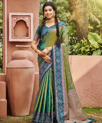 Green smart and ethnic woven soft silk blend saree 1