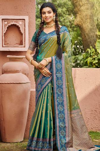 Green color smart and ethnic woven designer soft silk saree