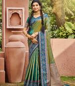 Green color smart and ethnic woven designer soft silk saree