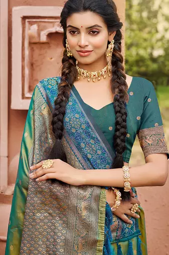 Green smart and ethnic woven soft silk blend saree
