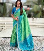 Pista color woven meenakari ikkat designer patola silk saree