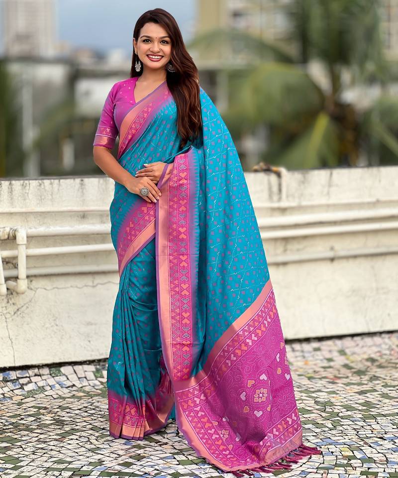 Sky blue color woven meenakari ikkat designer patola silk saree