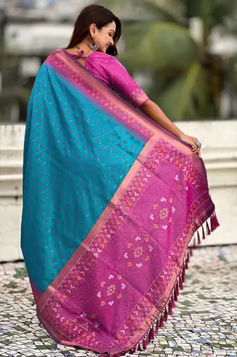 Sky blue woven meenakari ikkat patola silk blend saree