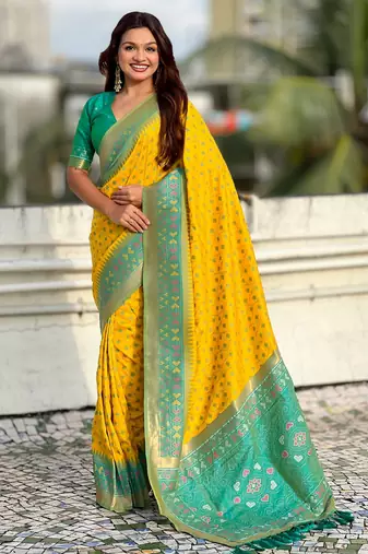 Yellow color woven meenakari ikkat designer patola silk saree