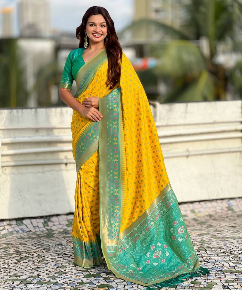 Yellow color woven meenakari ikkat designer patola silk saree