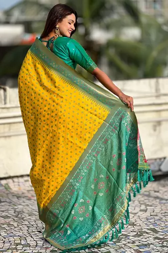 Yellow woven meenakari ikkat patola silk blend saree