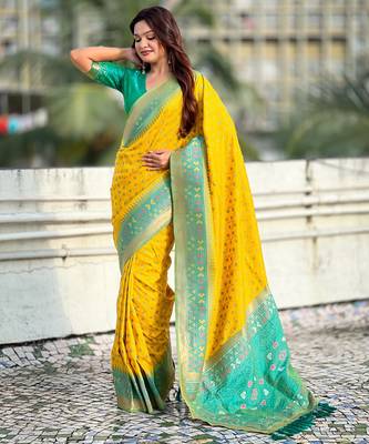 Yellow woven meenakari ikkat patola silk blend saree 4