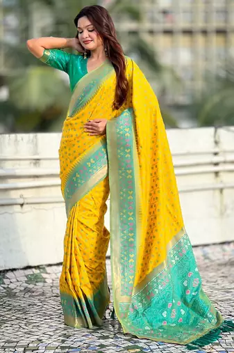 Yellow woven meenakari ikkat patola silk blend saree