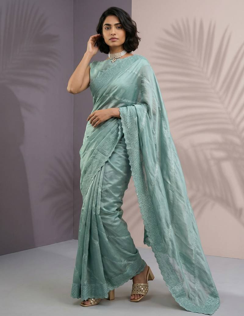 Green color rasberry silk fabric beautiful embroidered girlie saree