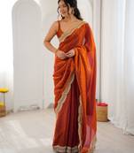 Orange color stylish fendy satin silk fabric bollywood style saree