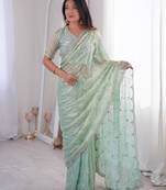 Olive embroidered silk blend saree