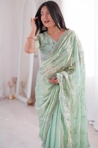 Olive embroidered silk blend saree