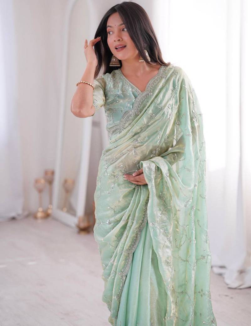 Olive embroidered silk blend saree