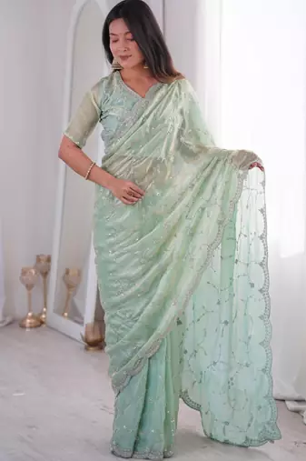 Olive embroidered silk blend saree