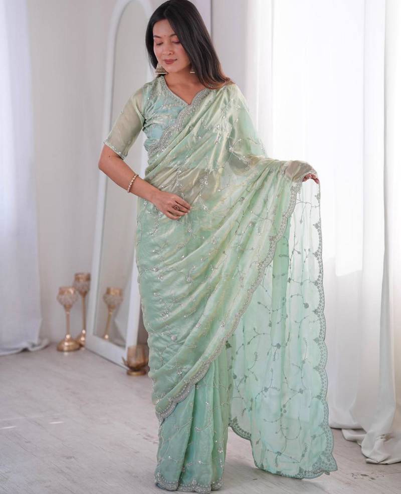 Olive embroidered silk blend saree