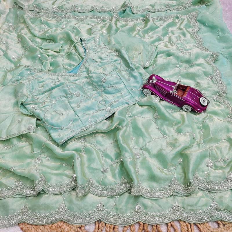 Olive embroidered silk blend saree