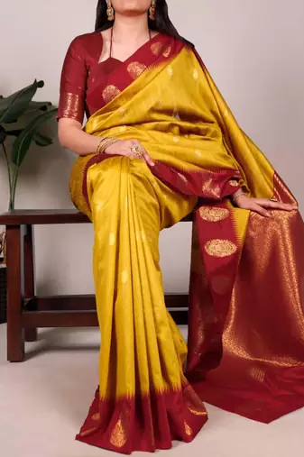 Yellow printed poly cotton saree with red zari border