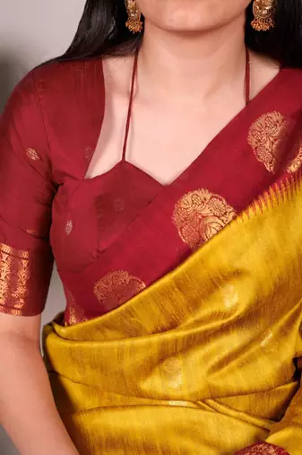 Yellow printed poly cotton saree with red zari border