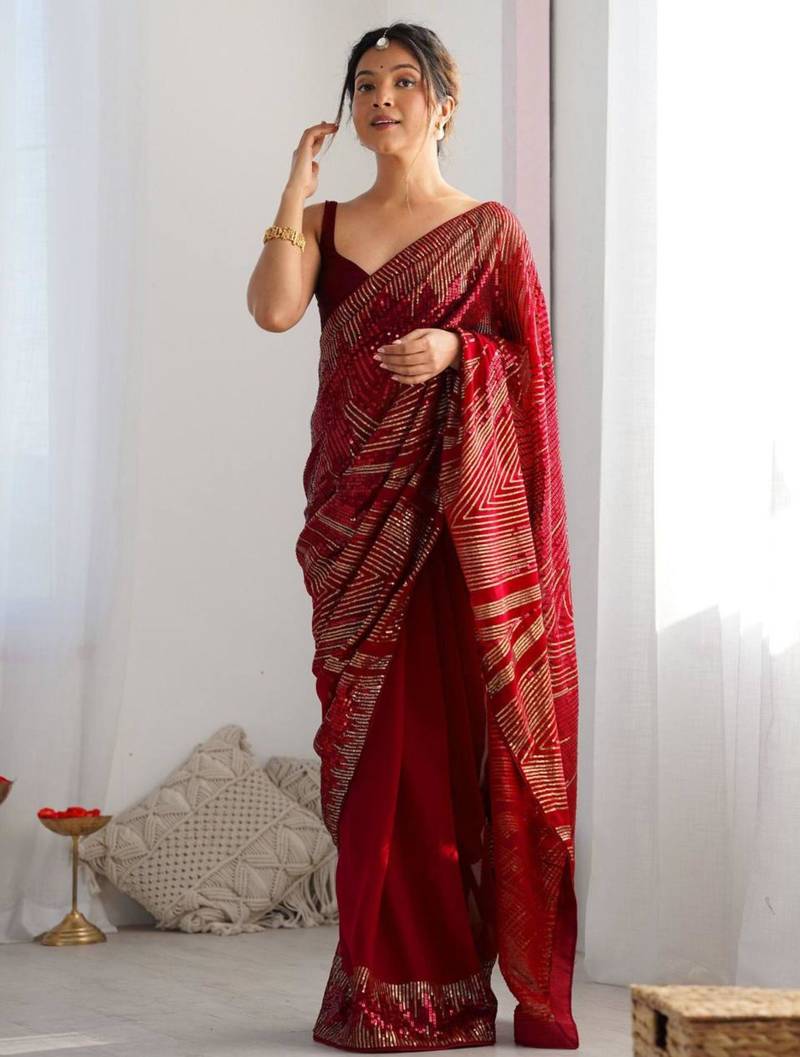 Red georgette saree with contemporary linear sequin embroidery