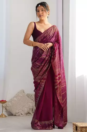 Purple georgette saree with contemporary linear sequin embroidery