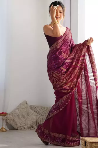 Purple georgette saree with contemporary linear sequin embroidery
