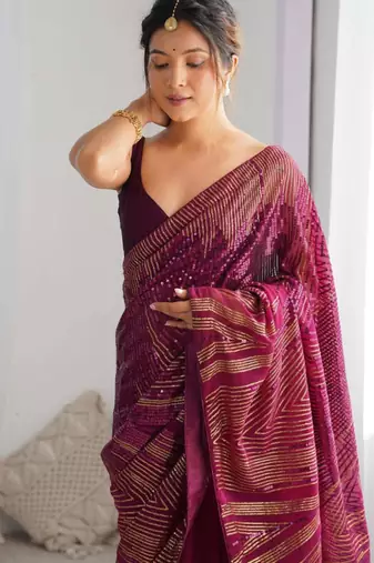 Purple georgette saree with contemporary linear sequin embroidery