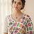 Multicolor printed saree with colorful geometric motifs and floral blouse