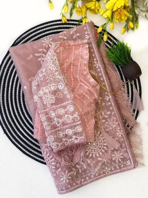 Pink embroidered net saree with feather-trimmed blouse and tassel detail 5