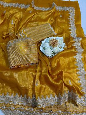 Yellow silk blend saree with scalloped zari border and striped blouse 2
