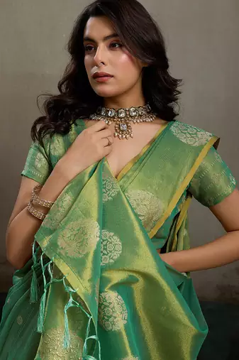 Green tissue silk blend woven partywear saree