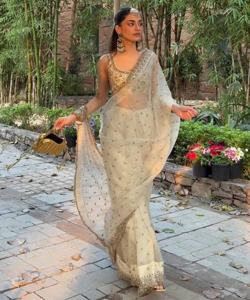 Cream embroidered saree with gold sequins-work