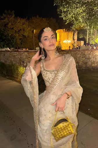 Cream embroidered saree with gold sequins-work